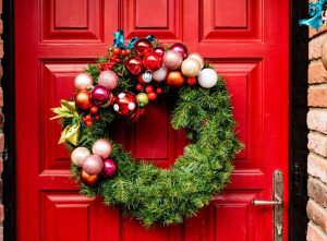 Wreath on Red Door During Holidays