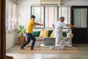 Seniors taking a tai chi class.