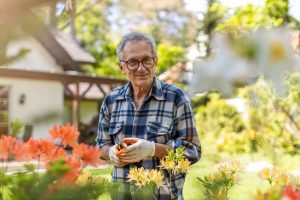 Older adult gardening at a senior living community
