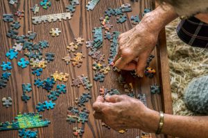 Seniors with a puzzle